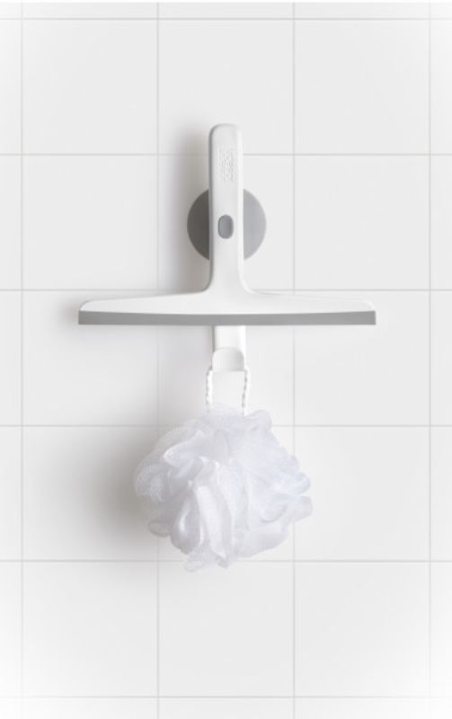 Slimline grey squeegee with suction-cup holder and hook for convenient storage and precise bathroom cleaning.