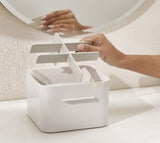 Elegant cosmetic organizer with compartments and drawer for efficient beauty routine, featuring chrome detail and easy access.