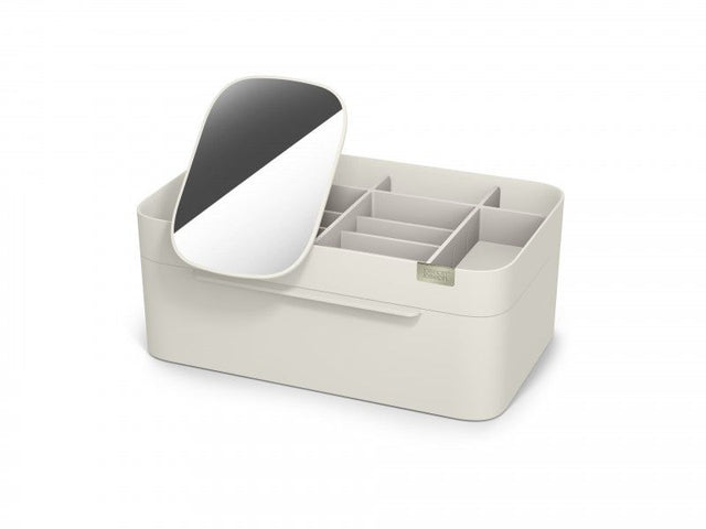 Large cosmetic organiser in Shell design with deep and shallow compartments, removable mirror, and stylish chrome badge.