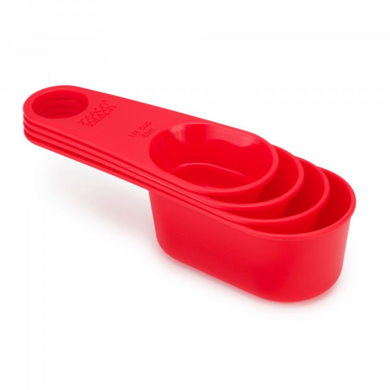 Red Joseph Joseph Duo 4Pc Measuring Cup Set featuring nesting cups and clip-together handles for stylish, space-saving storage.