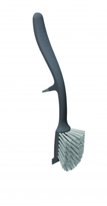 Joseph Joseph Edge Dish Brush in grey with integrated sink rest, non-scratch brush head, and pan scraper for efficient cleaning.