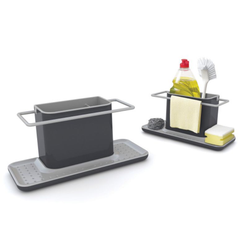 Large dark grey kitchen caddy by Joseph Joseph; organizes washing-up supplies, with space for bottles, sponges, and dishcloths.