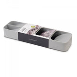 Joseph Joseph DrawerStore Compact Cutlery Organiser, a space-saving tray with angled compartments for efficient utensil storage.