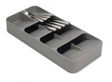 Joseph Joseph DrawerStore cutlery organiser in grey, featuring layered compartments for neat storage of over 48 utensils.