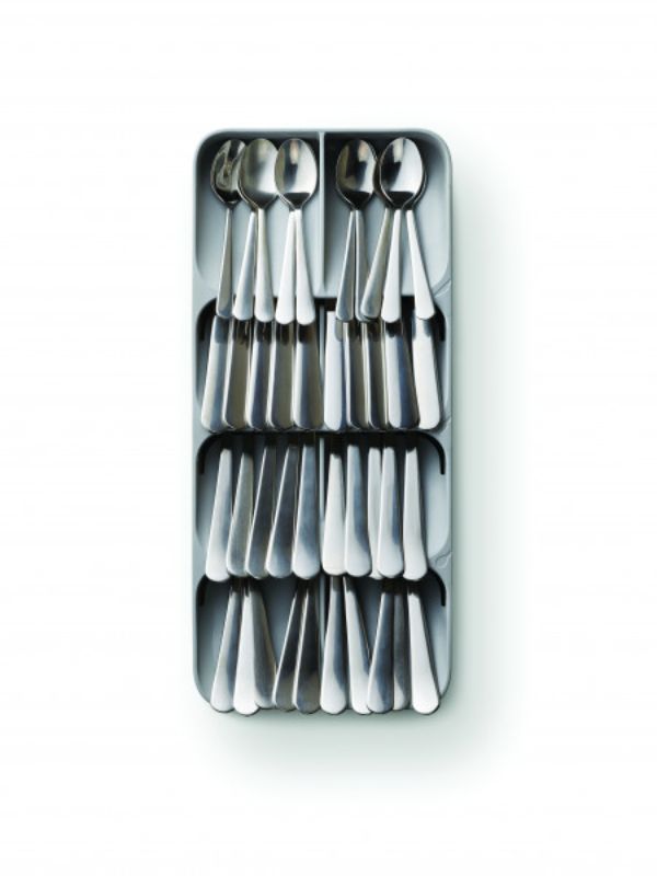 Joseph Joseph's Grey cutlery organiser features stacked compartments for 48+ cutlery, maximizing drawer space and organization.