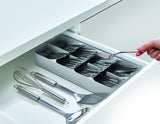 Joseph Joseph DrawerStore in grey, a compact cutlery organizer with layered compartments for efficient storage and easy access.