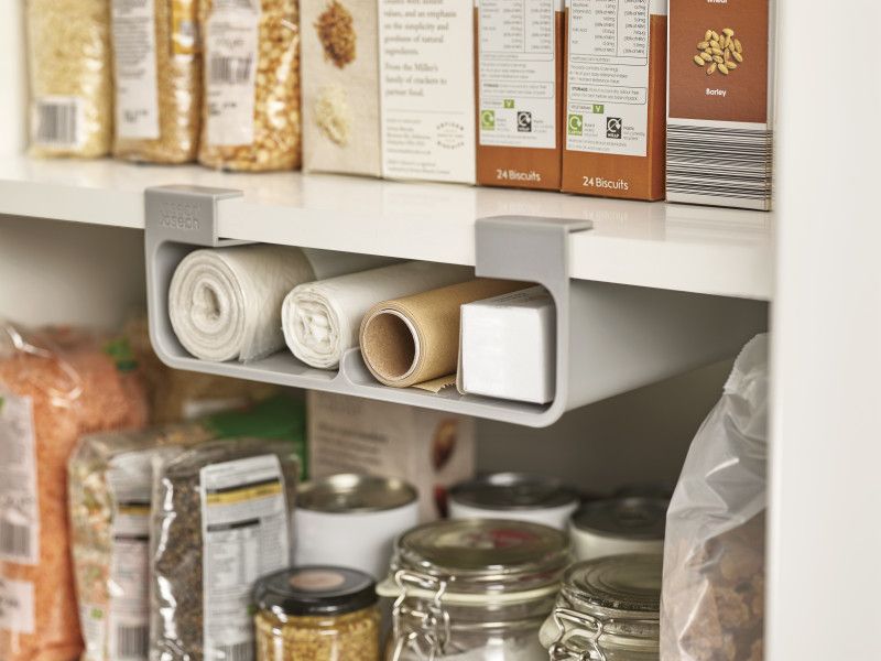 Joseph Joseph CupboardStore in Grey, a space-saving organizer for cling film and foil, designed for efficient kitchen use.