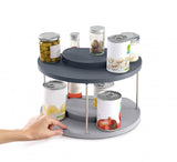 Joseph Joseph 2-tier rotating organiser in grey, designed to maximize cupboard space and enhance kitchen organization.