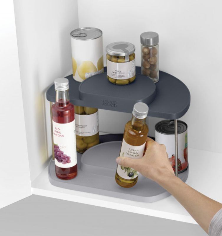 Joseph Joseph grey 2-tier rotating organiser for maximizing kitchen space and enhancing visibility of condiments and spices.