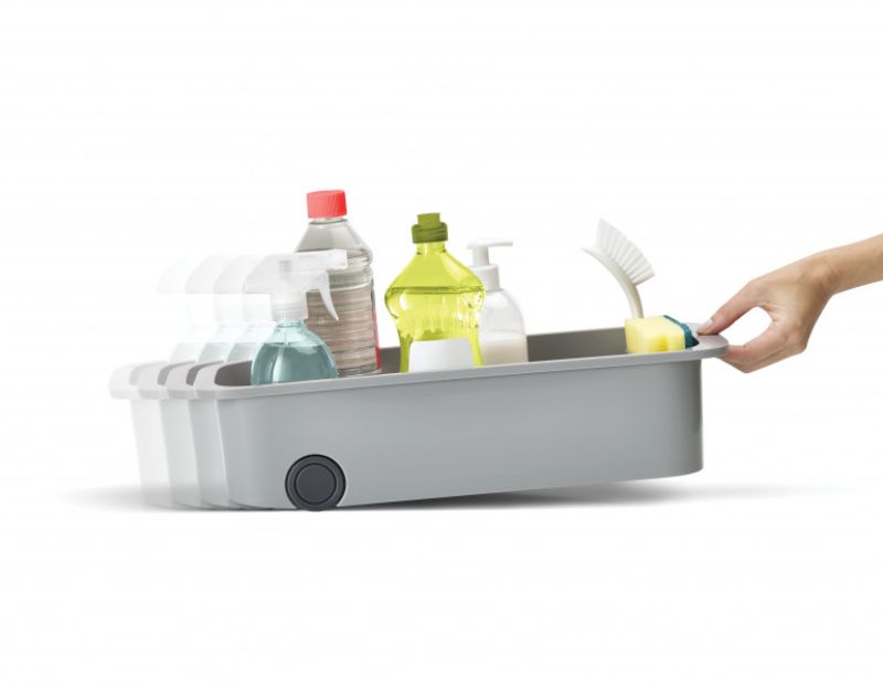 Grey Joseph Joseph CupboardStore caddy with compartments for cleaning supplies, designed for easy access and organization.