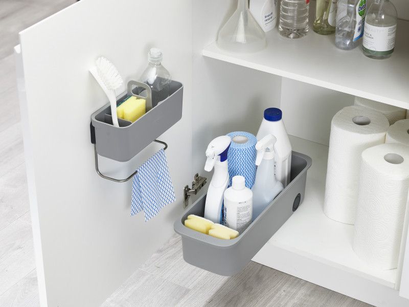 Joseph Joseph CupboardStore caddy in grey, featuring compartments for cleaning supplies and smooth wheels for easy access.