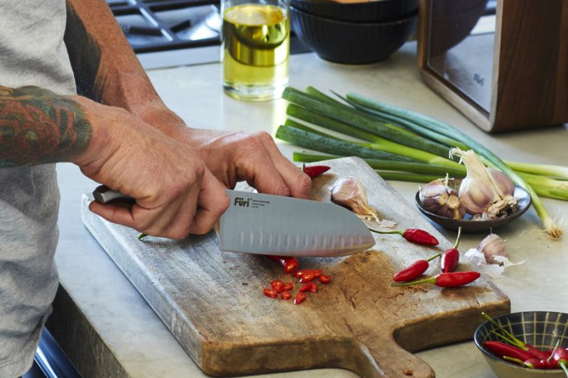 Furi Pro East/West Santoku Knife 17cm with Japanese stainless steel blade, innovative handle, and scalloped edges for precision cutting.