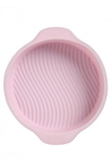 Flexible round cake pan designed for easy release, perfect for baking and versatile for fridge, microwave, and dishwasher use.