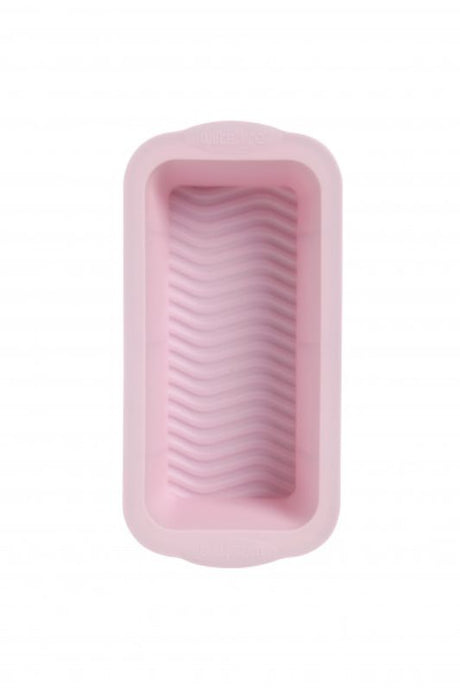 Pale pink flexible loaf pan for easy baking of meat loaf, banana bread, and ginger loaf with non-stick surface for simple release.